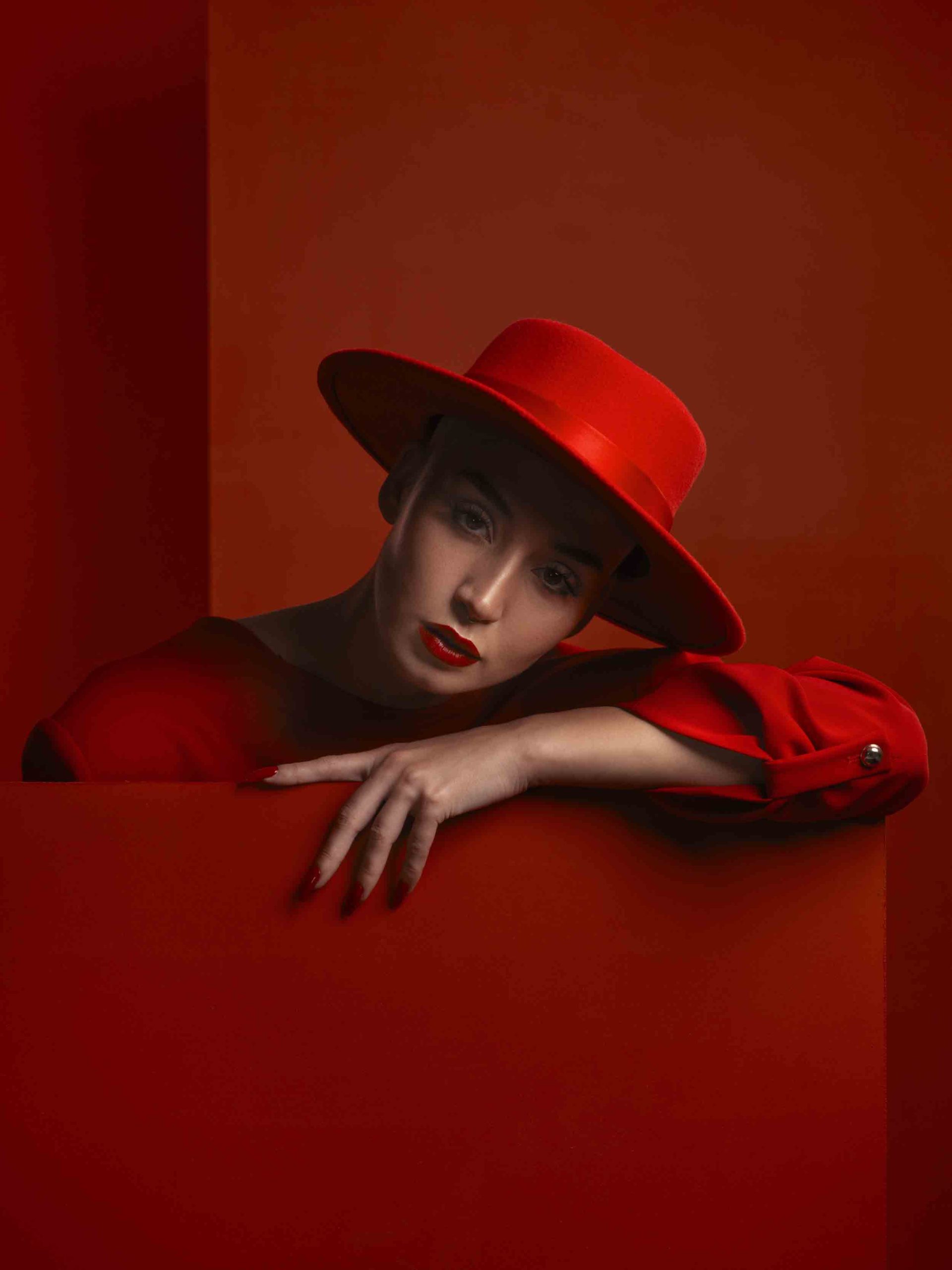Fashion, portrait and a vintage woman on a red background for a